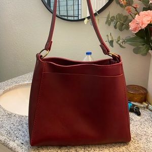 Portland leather goods triangle bag in cranberry